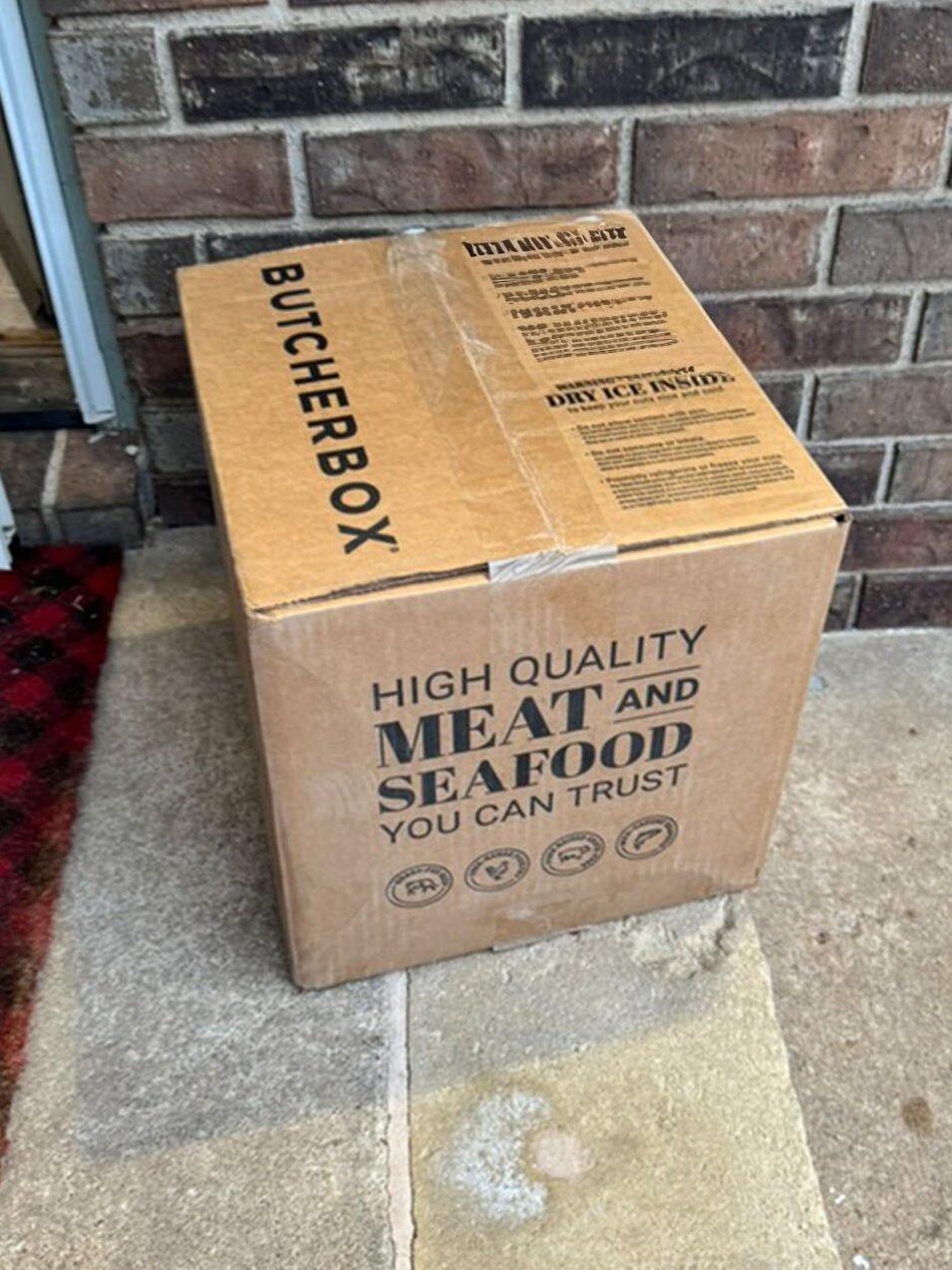 ButcherBox delivery box on porch